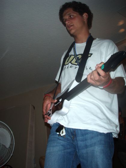 Chris guitar
Chris shredding out a song on Guitar Hero
