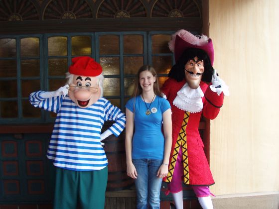 Michelle and pirates
Michelle with Hook and (MRS) Smee at Disney for her birthday
