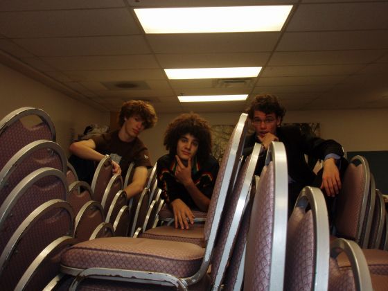 Brothas chairs
Jayce, Stevie, and I sitting on the chair pile in the church storeroom
