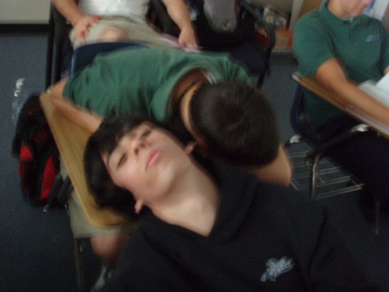 Anthony and Kyle sleeping
Two guys sleeping on the same desk during bible
