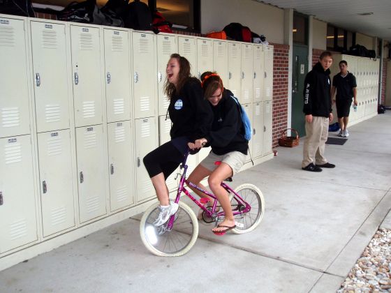 Caitlin bike
Caitlin and Emily riding on a bike through the halls
