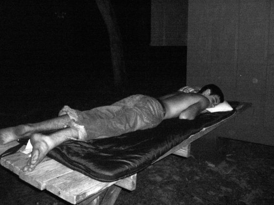 Evan sleeping
Evan on his makeshift bed outside on a table during retreat due to the lack of air conditioning
