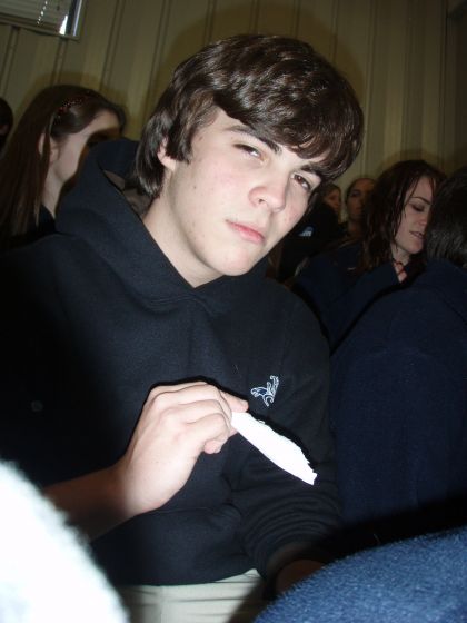 Marsh is blunt
Marsh, trying to be all cool, rolling up some paper during chapel
