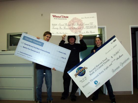 Check us out
Braden, Rebekah and I holding up a few random checks at 2nd Harvest
