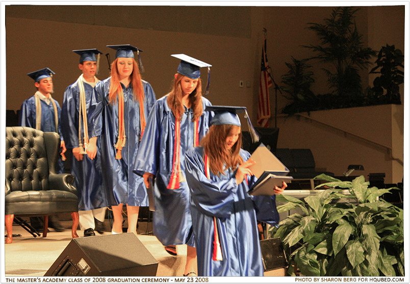 It's over! 4
Rachel, Nikki, Joanna, Brad, and Kyle leaving the stage; Rachel, if you didn't notice, has two diplomas in her hand: the one she has open is mine, which I forgot to bring with me as I left the stage
