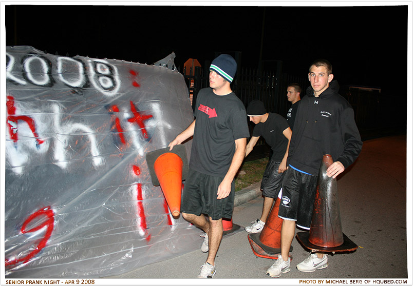 Setting it in place
The flag wouldn't stay on it's own so we had to cut it open a little and use the cones to hold it down
