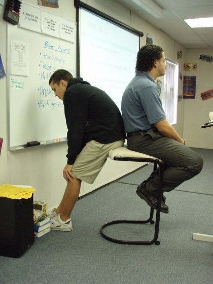 Cameron and Petrosky chair
Cameron drawing on the board while Mr. Petrosky takes prayer requests during 1st period Bible
