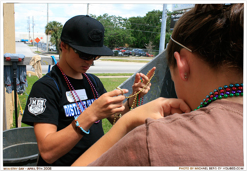 Beads 2
A different angle of Julia and Josh putting on some beads that they got at the Greater Orlando Food Bank
