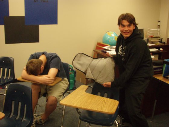 Tom turtleing
Tom turtles a sleeping student's backpack during government
