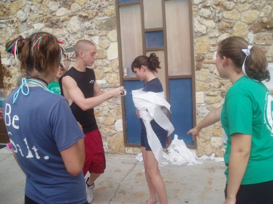 Rachel rolled
Rachel being toilet paper wrapped for the relay game at retreat
