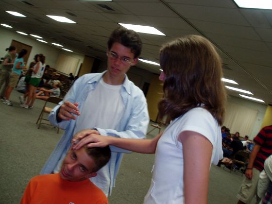 Petting Nathan
Stevie and Brittany petting Nathans head at retreat
