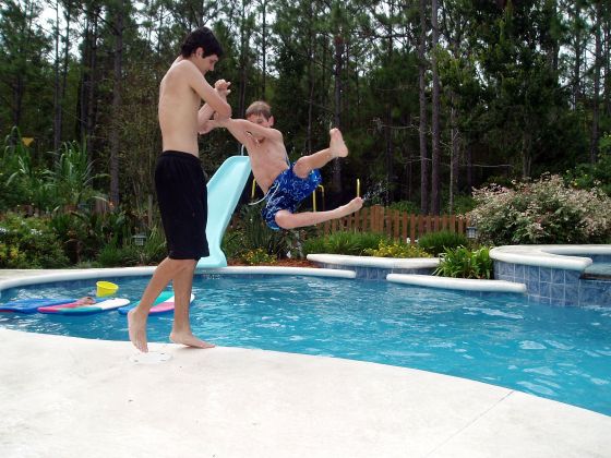 Tossed
Chris throwing Brittany's brother into the pool
