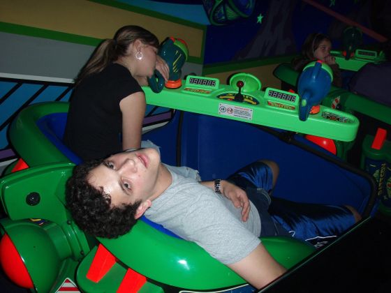 Chris and Sarah are through
The Buzz Lightyear ride took it all out of them
