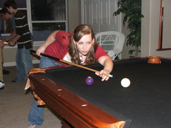 Hmm
Amanda carefully plans out her shot while playing pool at the Junior class Christmas party
