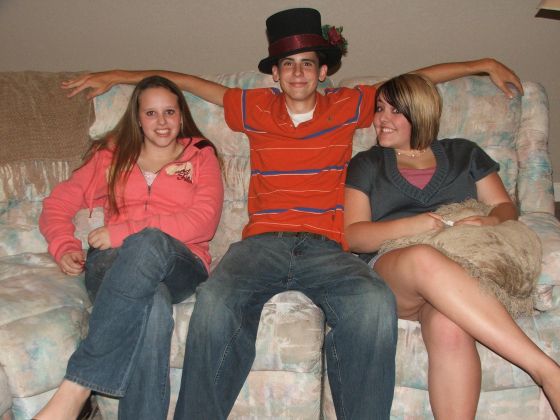 Brad's a pimpp
Brad poses with Amanda and Kayla at the Junior class Christmas party
