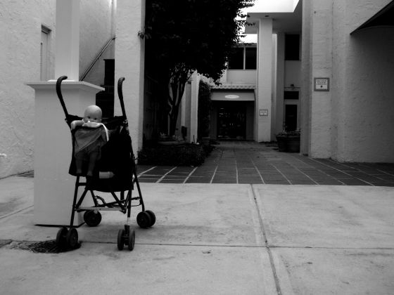 Abandoned Child
A randomly left stroller with baby doll on Park Avenue after the Winter Park Parade
