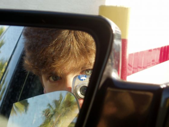 Van mirror
Me taking photos at McDonalds after school
