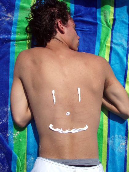 Sleeping smile
A photo of Stevie sleeping at the beach with only a smile's worth of sunblock on
