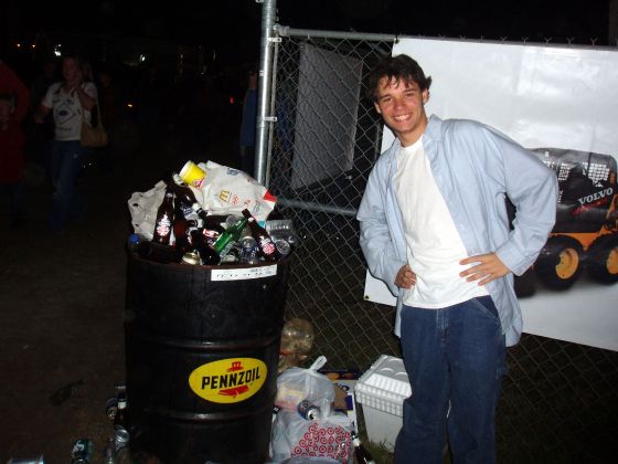 Trash! Beer!
Stevie posing next to the mountain of trash at Crashorama
