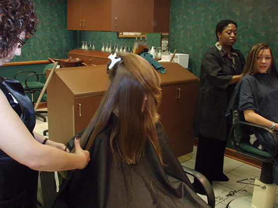 Hair monster!
Michelle getting a hair cut, the lady put all of her hair on her face. Amazing.
