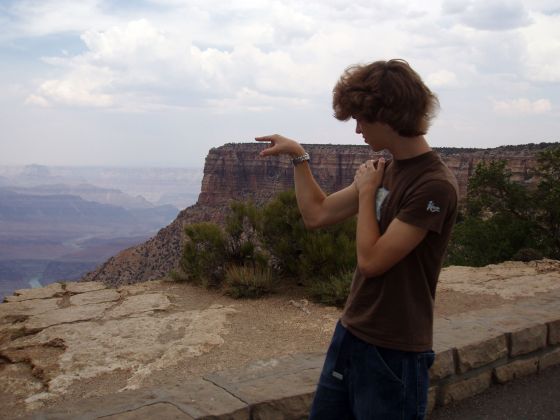 The canyon is over there
Me doing the joke hunk pose next to the rim
