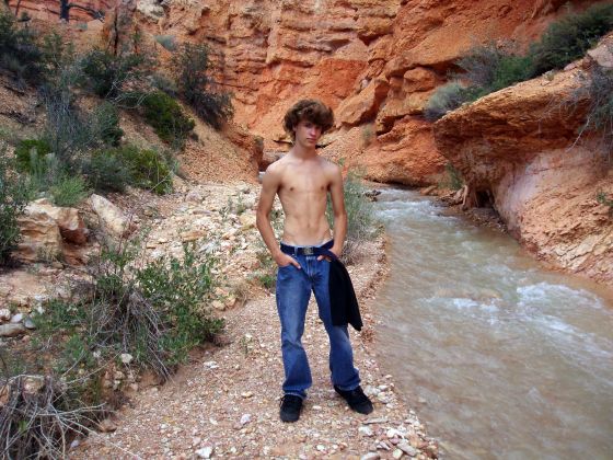 Posing (again)
Standing next to a stream, the weather was really nice so the shirt was definitely off
