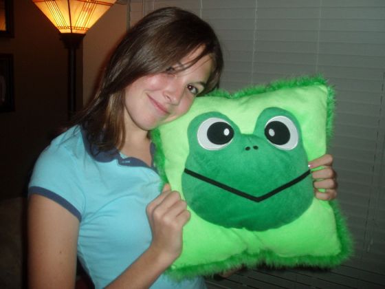 Brittany's frog pillow
Brittany with her beloved frog pillow at Braden's The Ring video party

